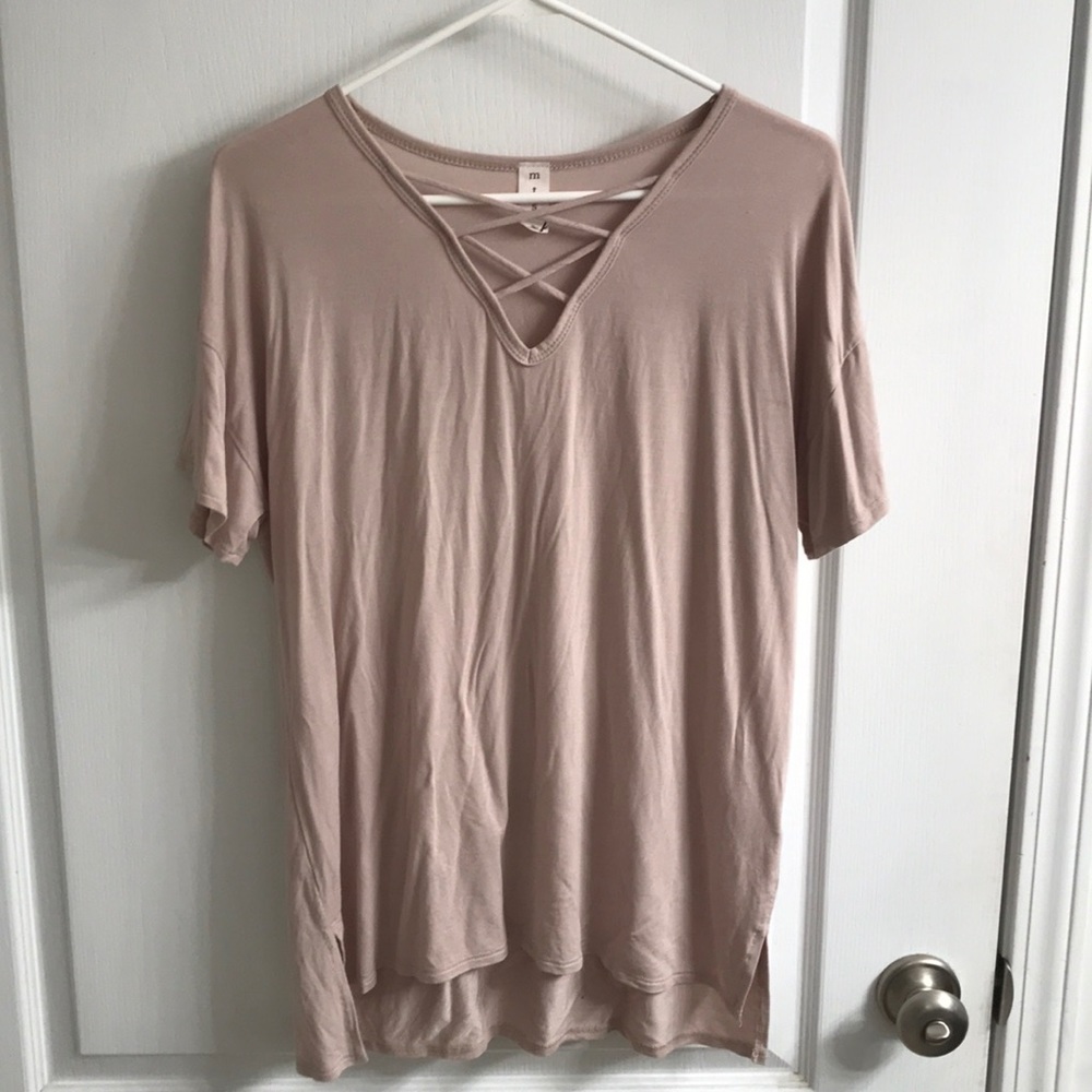 loose fitting t-shirt with criss-cross detailing